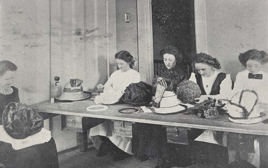 Girls working on dressmaking